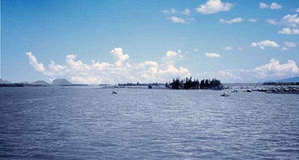 6. China Beach, Đà Nẵng: Marble Mountain, left-center, with sampan fishermen plying their trade.