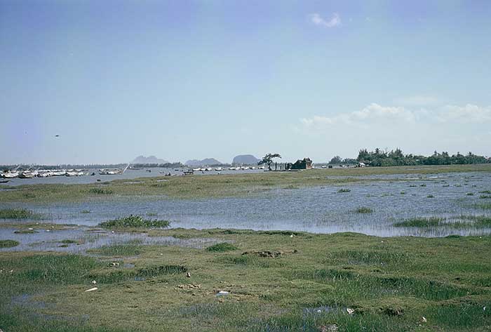  14. China Beach, Đà Nẵng: Sampans and shoreline Pagado (center).