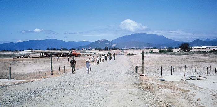 36. China Beach, Đà Nẵng: The road back to Đà Nẵng AB (Freedom Hill 327, center). I guess we'll have to pave the road to. I'm bored-- Yeah... me to. Let's go back to base.