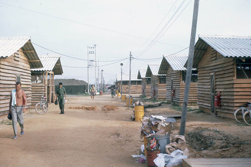 1. Đà Nẵng AB, Tent City: Hammering and heat keeps us awake, but it is sweet music -- no more wooden pallet floors! 1965.
