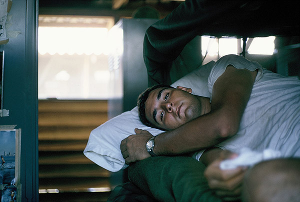 5. Đà Nẵng AB, Tent City: Finally--Gary Eberbach gets some A.M. sleep! I got the lower bunk--heat rises so I volunteered Gary for the top bunk. 1965.