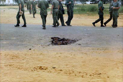 14. Đà Nẵng AB, Tent City: Two years later, Rocket Crater in 1967, just outside AP Hut on road. 1967.