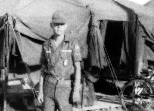 1. Đà Nẵng AB, Tent City: A2C James Bruce Jones (JB) read to go to post. 1966.