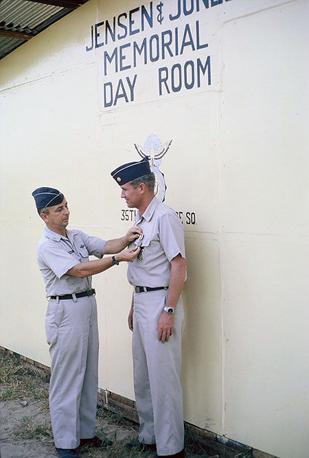 18. Đà Nẵng AB, Tent City: The new base commander, Colonel Eisenbrown, a full bird,pinned a well deserved Bronze Star w/V on Major Rupert. 1966.