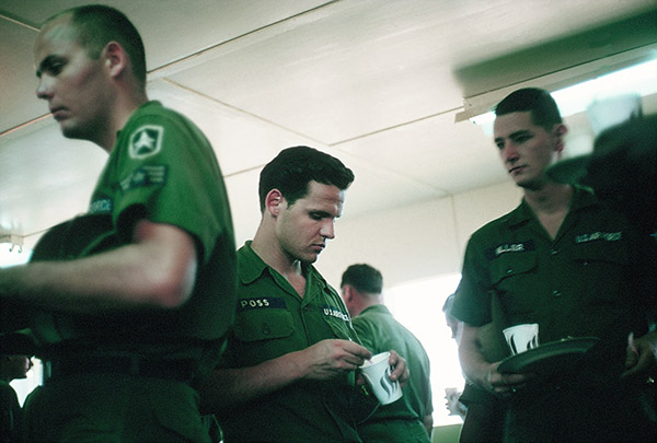 23. Đà Nẵng AB, Tent City: Don Poss (center), Airman Miller (right). After an hour or so, the crowd began to thin. Men reported to duty. Rank reassumed. Some eager to leave. 1966.