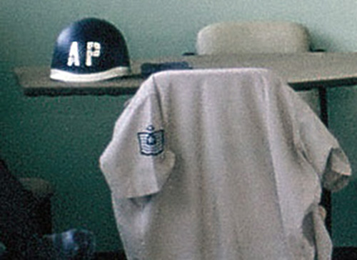 26. Đà Nẵng AB, Tent City: AP Helment and MSgt's shirt is draped over a chair. 1966.