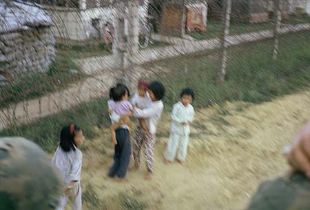 33. Đà Nẵng, K-9 Growl Pad: In route to Firing Range, babysans waving. 1965-1966.