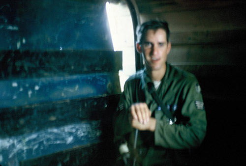 23. Đà Nẵng AB, K-9 Growl Pad: A1C Don Jones rides in posting truck. 1965.