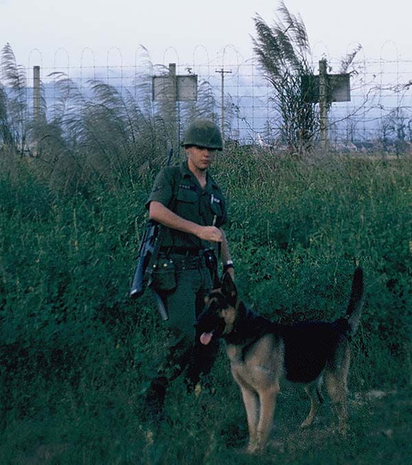 43. Đà Nẵng AB, K-9 Growl Pad: Close up of Don Poss and Blackie. 1965.