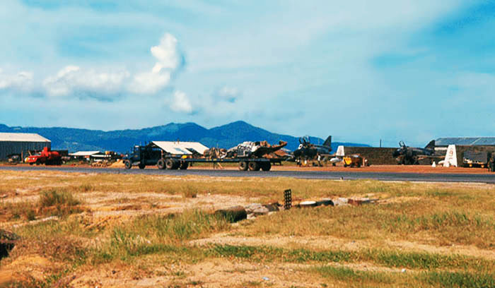 B-57 debris loaded on a flatbed truck in route to a hanger for evaluation, then to its final resting place in an aircraft boneyard.