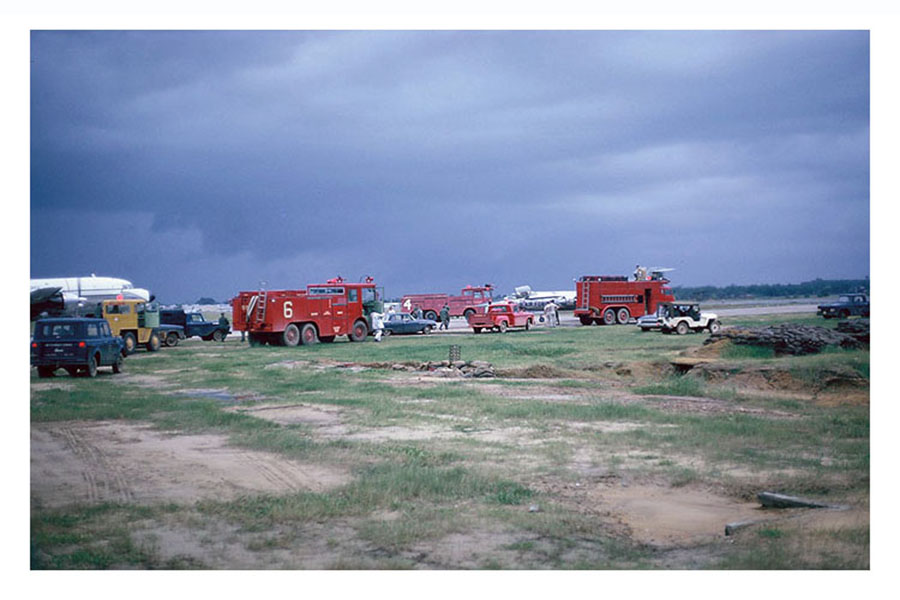 13. Đà Nẵng AB, flight line: Crash Crew await another inflight emergency landing, or combat damaged aircraft. 1965.