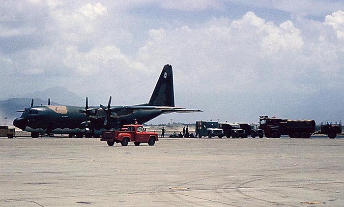 18. Đà Nẵng AB, flight line: Click to see Full Panorama View of C-130 loading medevacs to TSN, Japan, or connection to USA. 1965.