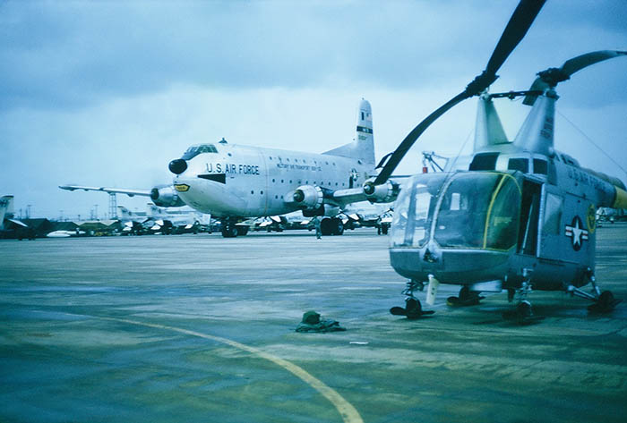 42. Đà Nẵng AB, flight line: Rescue Pedro helicoper parked. C-124 Gloabmaster background center. 1965. 