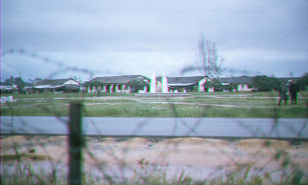 20. Đà Nẵng AB, Tent City: ARVN Uplifted Wings Memorial to Fallen Airmen across from Tent City. 1965.