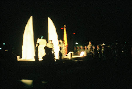 For a major dedication ceremony, attendance was poor. True, there were SVN flags, banners, spotlights sweeping a starry night sky, bonfires, and civilians standing around... someone got a medal, and a Vietnamese civilian gave a speech which no one applauded. When it was over, the crowd faded quietly into the night. The memorial, Uplifted Wings, was touted as an eternal flame... but sometime during that dedication night, the flame went out... and... was never re-lit.