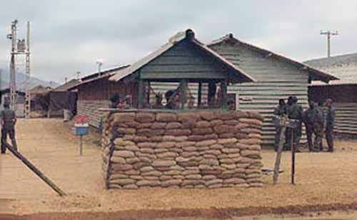 1. Đà Nẵng Air Base: 366th SPS, New Huts replacing still used tent-city in background. Improved SP Access Post Bunker. Photo by Ron Westering, 1966-1967.