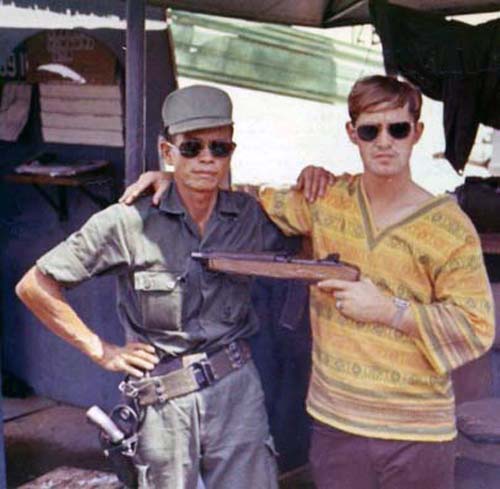 1. U.S. Embassy, Saigon, ARVN Guard (left) and SP (right). Photo by: unknown.