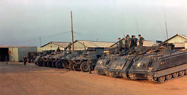 1. Biên Hòa AB, Security Police M113 APC (right), and V100s (left). Photo by: Ernest Govea. 1968-1969.