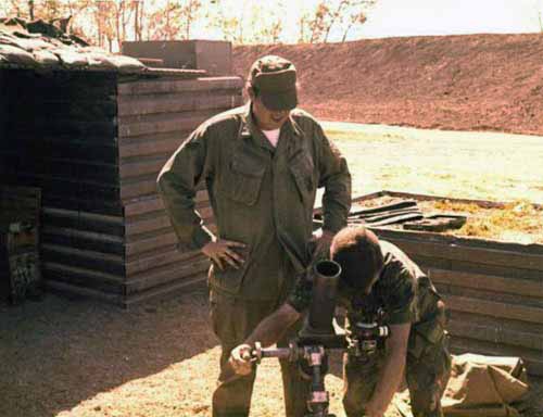 3. Korat RTAFB: Sgt Stillwell and Sgt David Worthen, aiming mortar. 1972-1973. Photo by: David Worthen, BH, 3rd SPS; KRT, 388th SPS. 1969-70; 1972-73.