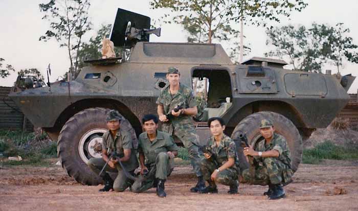 1. NKP RTAFB, V100: Curtis Hammond (standing) and four Thai Guards. 1973. Photo by: Curtis Hammond, NKP, 56th SPS, QRT Heavy weapons, 1973-1974.