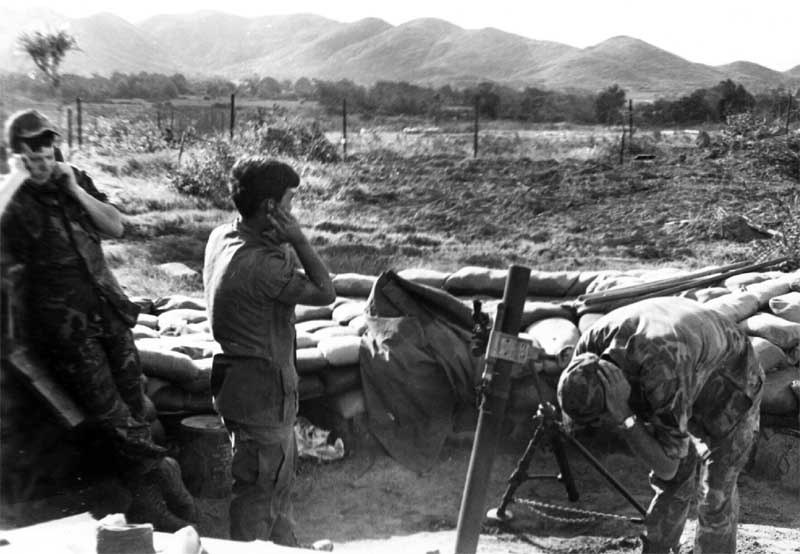 12. Phu Cat AB, Here’s one of the 81mm mortar in action, Cobra Flight, Charlie 10, Phu Cat. 1968-1969. Photo by: Mike Sipes, PC, 37th SPS, 1968-1969.