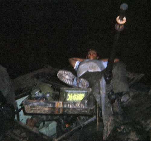 9. Phan Rang Air Base: V100, Steve Cole with .50cal. 1970. Heavy Weapons' have the Biggest Guns. Photo by: Joe Taragowski, PR, 35th SPS, 1970.