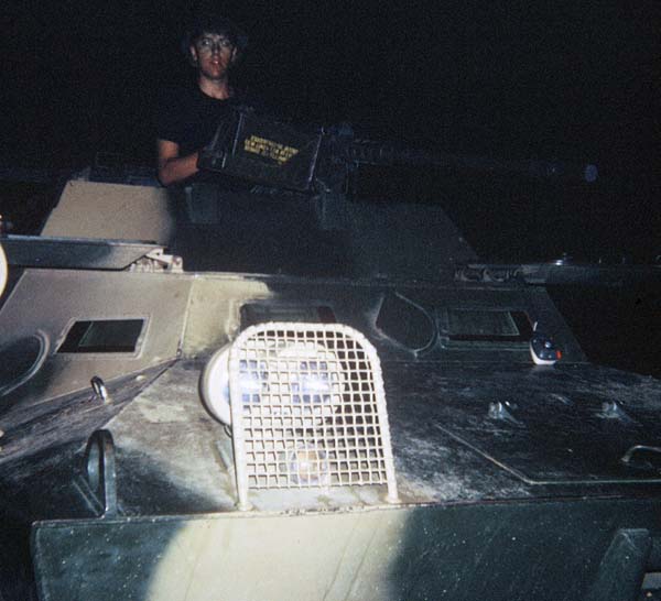 8. Phan Rang Air Base: Joe Taragowski, V100 HW, ready for the night with .50cal. 1970. Photo by: Joe Taragowski, PR, 35th SPS, 1970.