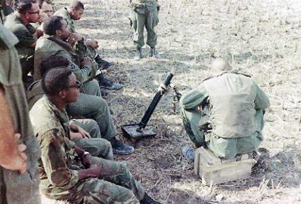 18. Tan Son Nhut AB, 377th SPS Special Weapoons Unit Convoy, test firing 60-m Mortars. 1968. We were out practicing that day, fired the mortars, law rockets, and the 40mm grenade launcher, the XM-148, and we even had a few thumpers. Photo by: Larry Blades, TSN, 377th SPS, 1967-1968.