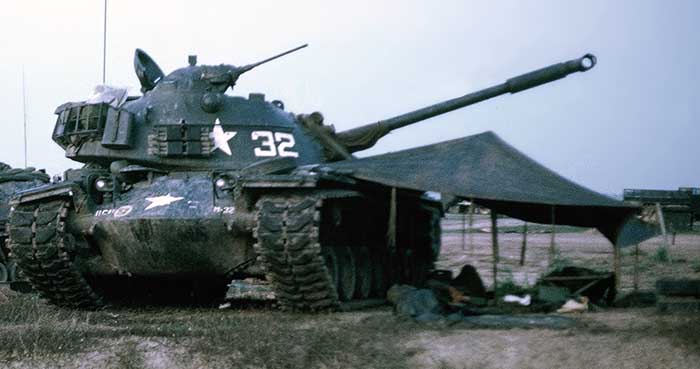 2. Tan Son Nhut AB, US Army tanks, and closeup of rigged-tent to right. 1968. Photo by: Charles Martinkus, TSN, 377th SPS, 1966-1968.