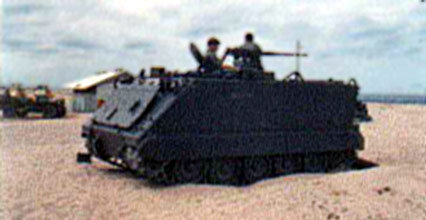 10. Tuy Hoa AB, M113, with .50cal machinegun, and Bunker with M-60. Photo by: Domenic Sebben, NT, 14th SPS; TUY, 31st SPS, 1969-1970.