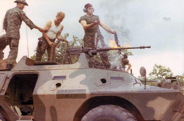 3. Ubon RTAFB. V100 .50cal. machinegun. Barrel on fire! L/R: Thai Guard, Walker, James Wilson. 1971-1972. Photo by: Everett (Willie) Squires,UB, 8th SPS, HW, 1971-1972.