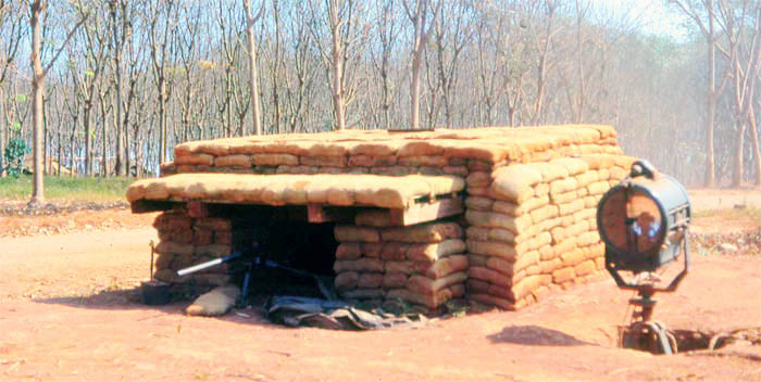 Nui Dat, Australian Bunker, machinegun poking out, with Search Light at the ready. MSgt Summerfield: 08