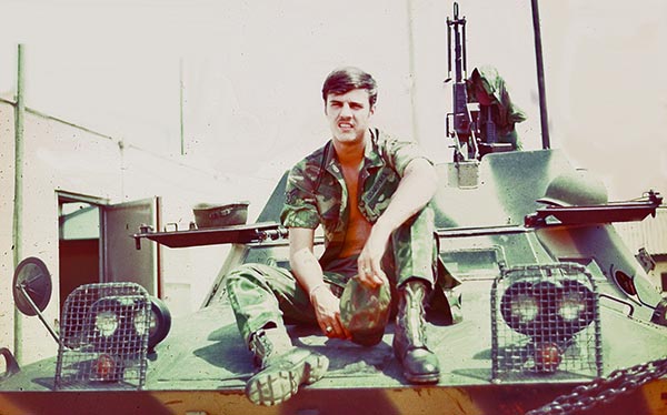 4. TSN Air Base: George L. Logan, sitting on Duck vehicle.