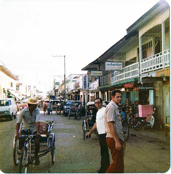 7. NKP RTAFB: TSgt Hutcheson, LE Flight Chief, and SSgt Wheatley, downtown. Photo by John Schwendler. 1974-1975.