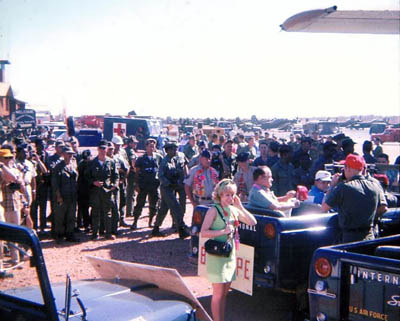 Bob Hope getting into escort Jeep. 1968