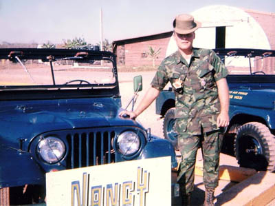 Sgt Paddock on guard at Escort Jeep