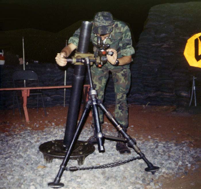 5. NKP RTAFB: 81mm Mortar Sighting. Photo by Wilfred Wright. 1971.