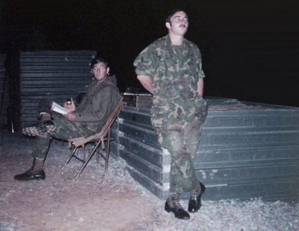 9. NKP RTAFB: Mortar Pit 3: A1C J. Brady and Jim Allen. Photo by Wilfred Wright. 1971.