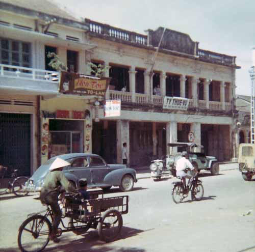 Photo #13 (Nha Trang): This is a shot of me in my cube in the new barracks. I often thought about sending this photo to Hills Bros Coffee for an ad but never did.