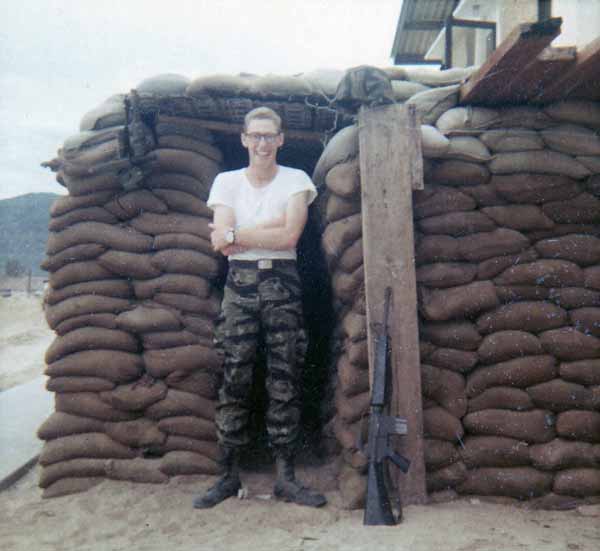 Photo #13 (Nha Trang): This is a shot of me in my cube in the new barracks. I often thought about sending this photo to Hills Bros Coffee for an ad but never did.