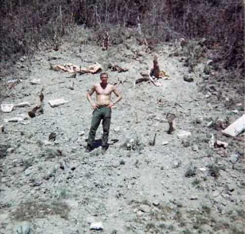 Photo #13 (Nha Trang): This is a shot of me in my cube in the new barracks. I often thought about sending this photo to Hills Bros Coffee for an ad but never did.