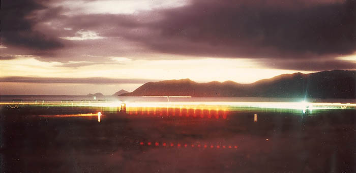 8. Nha Trang AB. Dawn View from Tower-320 (timed-exposure photo). Photo by: Jim Costello, LM 552. 1969-1970.