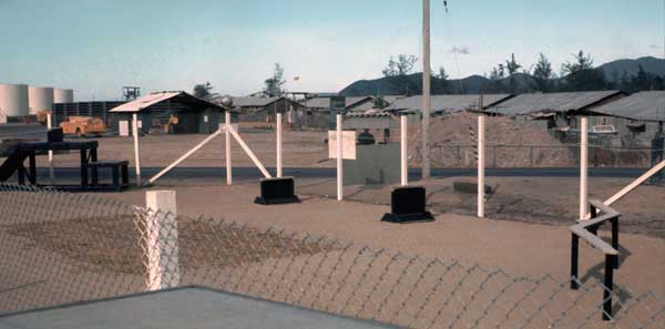 1. Nha Trang AB, K-9. Gate Post (center). Note Tower (center left). Photo by: Joe Russo, NT, 14th SPS; PR, 35th SPS K9: Prince 522M. 1969-1971.