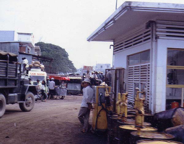 5. Nha Trang Air Base: Downtown market area, traffic, and a gas station. Photo by Phil Lange, 1968-1969.
