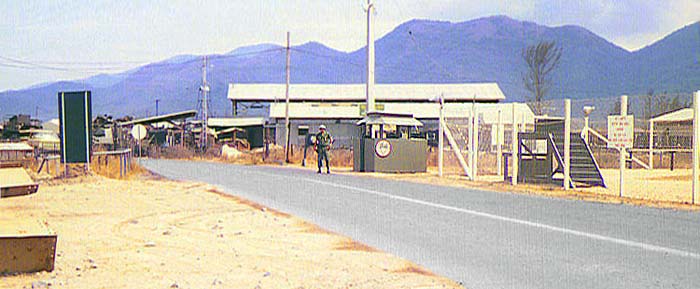 16. Nha Trang AB Gate Post-4, by K-9 Training (note stairs inside fence). Photo by: Tony Niemotka, LM 577, NT, 14th SPS, 1968-1969.