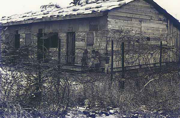 17. Nha Trang AB Gate Post-4. View of housing from Post-4. Kids playing on porch. Photo by: Tony Niemotka, LM 577, NT, 14th SPS, 1968-1969.