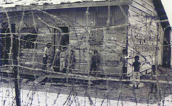 18. Nha Trang AB Gate Post-4. View from Post-4. Mamasan shewing kids inside. Photo by: Tony Niemotka, LM 577, NT, 14th SPS, 1968-1969.