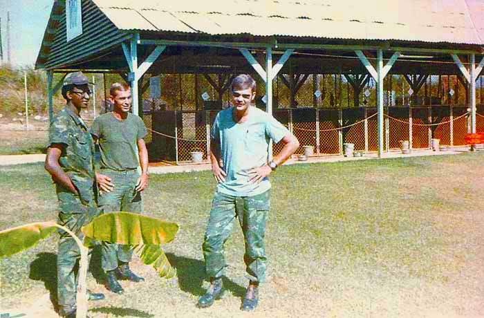 4. Veterinarian on right, Vet. Assistant on left, and TSgt Houston in middle.