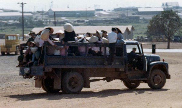 Vietnamese civilian workers coming to work.