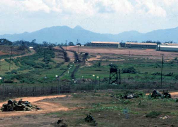 19. Close Up: The Phu Cat AB perimeter on the east side of the base, from Tango 4 looking south. Photo by Don Bishop. 1969-1970.